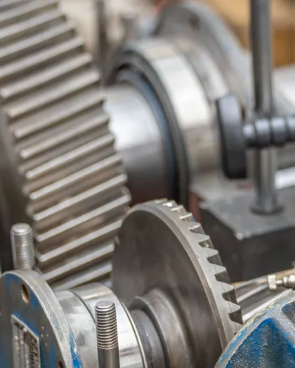 Close view of metal gears and machine components